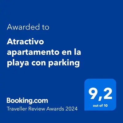 Certificado, premio, señal o documento que está expuesto en Atractivo apartamento en la playa con parking
