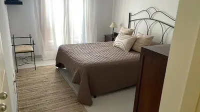 Cama o camas de una habitación en Apartamento Vera Playa (ALTOS NUEVA VERA)