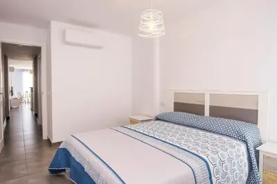 Cama o camas de una habitación en MIRAMAR - AVD. FARO MESA ROLDAN