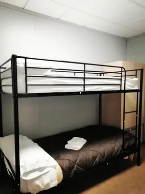 Cama o camas de una habitación en Albergue La Paz de Las Alpujarras