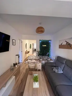 Una televisión o centro de entretenimiento en Piso agradable cerca de la playa
