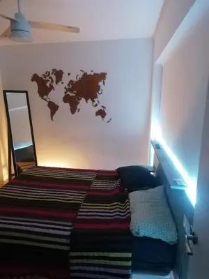 Cama o camas de una habitación en Piso agradable cerca de la playa