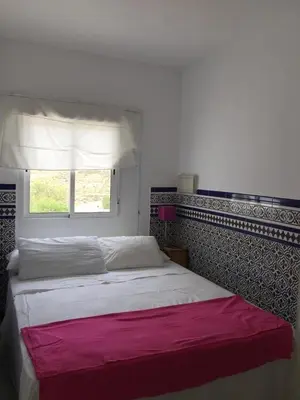 Cama o camas de una habitación en Casa en el valle de los Escullos
