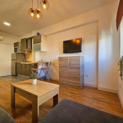 Una cocina o zona de cocina en Precioso apartamento con estilo.