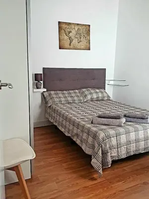 Cama o camas de una habitación en Precioso apartamento con estilo.