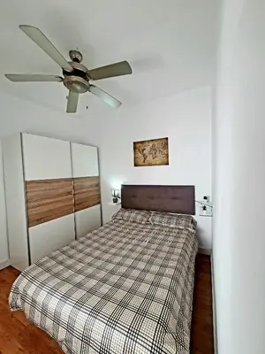 Cama o camas de una habitación en Precioso apartamento con estilo.
