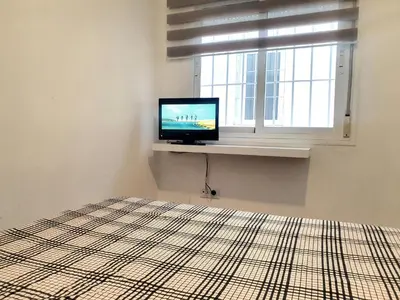 Cama o camas de una habitación en Precioso apartamento con estilo.