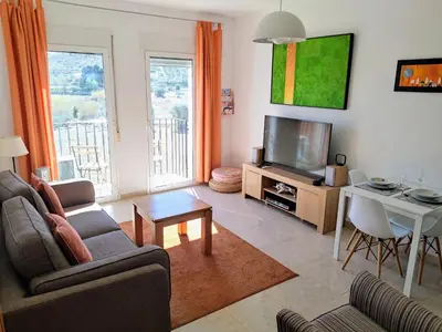 Una televisión o centro de entretenimiento en Apartment-in-turre-andalucia