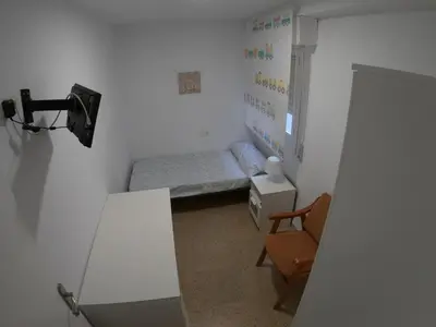 Una televisión o centro de entretenimiento en Piso en Zapillo con vistas al mar