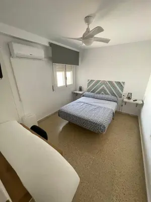 Cama o camas de una habitación en Piso en Zapillo con vistas al mar