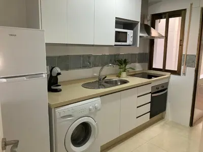 Una cocina o zona de cocina en APARTAMENTOS SOL ANDALUZ - GOYA