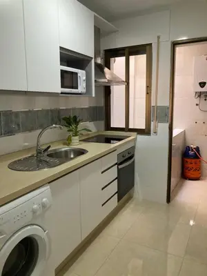 Una cocina o zona de cocina en APARTAMENTOS SOL ANDALUZ - GOYA