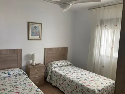 Cama o camas de una habitación en APARTAMENTOS SOL ANDALUZ - GOYA