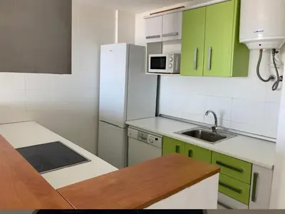 Una cocina o zona de cocina en Ático con Espectaculares Vistas al Mar