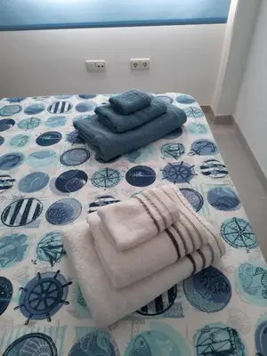 Cama o camas de una habitación en Ático con Espectaculares Vistas al Mar
