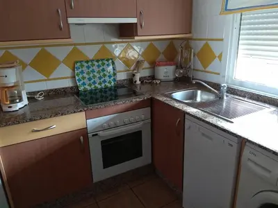 Una cocina o zona de cocina en Vera Playa 2 hab 2 WC parking AA, Wifi, padel piscina climatizada y verano Lomas de mar
