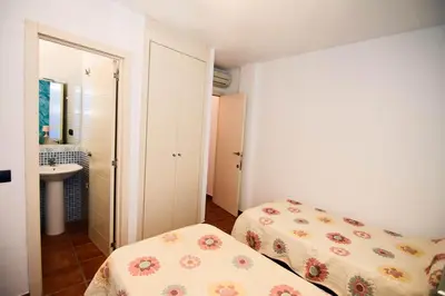 Cama o camas de una habitación en MARLOP´S ROOMS