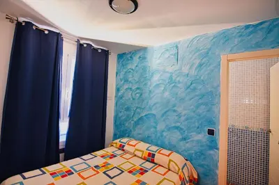 Cama o camas de una habitación en MARLOP´S ROOMS