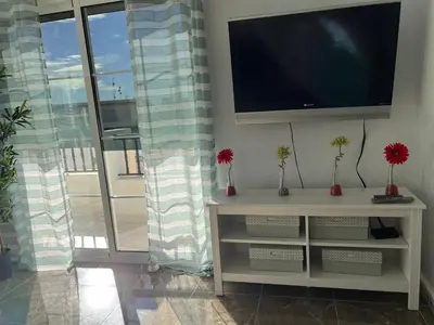 Una televisión o centro de entretenimiento en Apartamento Carboneras playa - 2 Habitaciones
