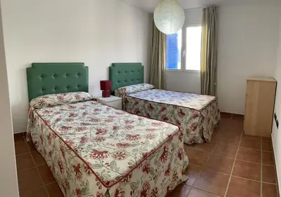 Cama o camas de una habitación en Apartamento de 3 dormitorios a 60 m de la playa en la Isleta, Cabo de Gata