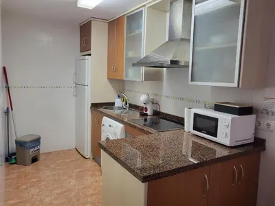 Una cocina o zona de cocina en ¡Apartamento cerca de la piscina en paraíso de Vera!