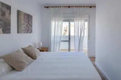Cama o camas de una habitación en La Terraza de Agua Amarga