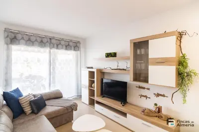 Una televisión o centro de entretenimiento en Apartamento Residencial Mirador Playa Serena