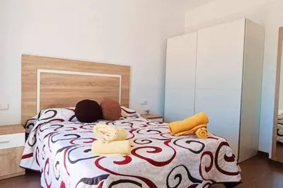 Cama o camas de una habitación en Terraza Sol y Mar
