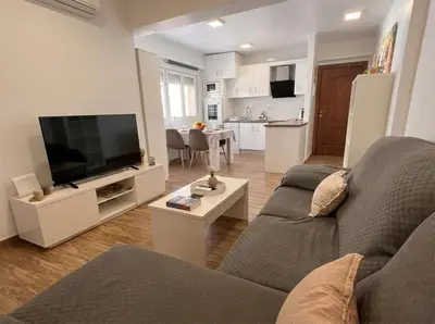 Una televisión o centro de entretenimiento en Brisa & Beach a 3 Min de la Playa Zapillo
