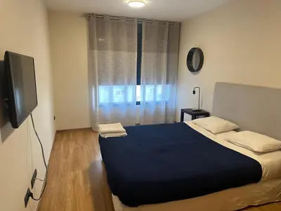 Cama o camas de una habitación en GES Homes