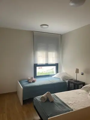 Cama o camas de una habitación en GES Homes