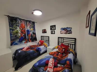 Cama o camas de una habitación en ¡Espectacular Marvel®Ático con piscina privada en primera línea de Vera-Playa!