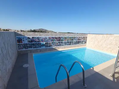 Piscina en o cerca de ¡Espectacular Marvel®Ático con piscina privada en primera línea de Vera-Playa!