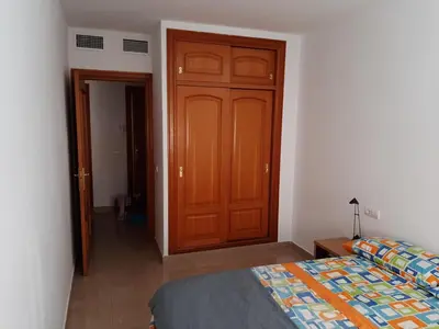 Cama o camas de una habitación en Spacious 1 bedroom flat in Almeria, by the beach