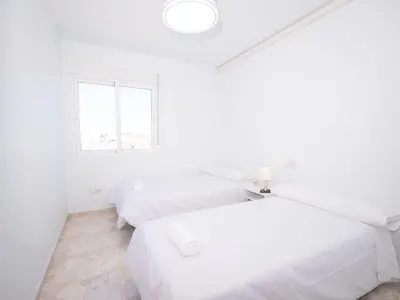Cama o camas de una habitación en Frente al Mar con Garaje y Wifi - by Aloha Palma