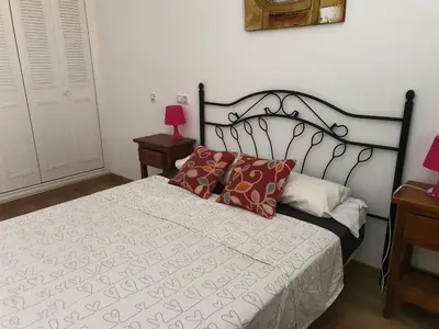 Cama o camas de una habitación en APARTAMENTO NATURISTA