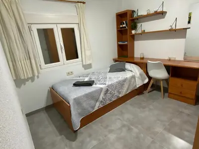 Cama o camas de una habitación en ¡Cómo en casa! Precioso apartamento en Almería