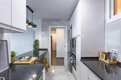 Una cocina o zona de cocina en Apartamento El Palmer