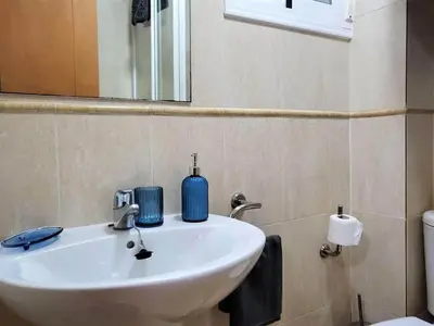 Un baño de Apartment with Pool near Garrucha Beach