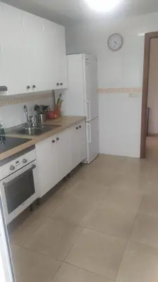 Una cocina o zona de cocina en HABITACIONES EN frente DEL PUERTO