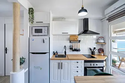 Una cocina o zona de cocina en Apartamento Faro 1
