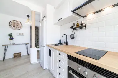 Una cocina o zona de cocina en Apartamento Faro 1