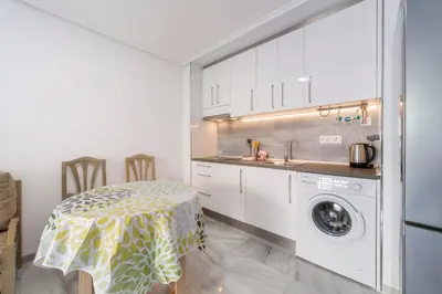 Una cocina o zona de cocina en Apartamento Faro 2