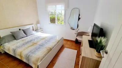 Cama o camas de una habitación en Villas de Almerimar Golf