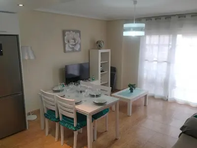 Una televisión o centro de entretenimiento en Apartamento céntrico cerca de la playa I