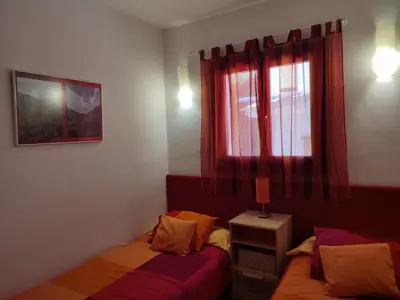 Cama o camas de una habitación en La Launa apartamento rural