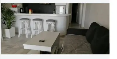 Zona de estar de APARTAMENTO BAJO NATURISTA A PIE DE PLAYA.