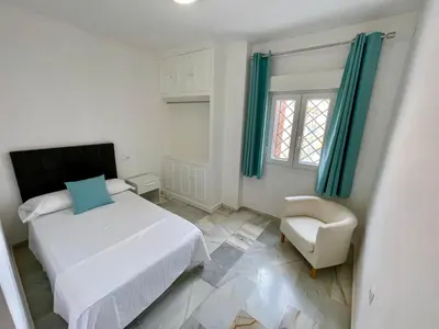 Cama o camas de una habitación en Apartamentos Valparaiso II
