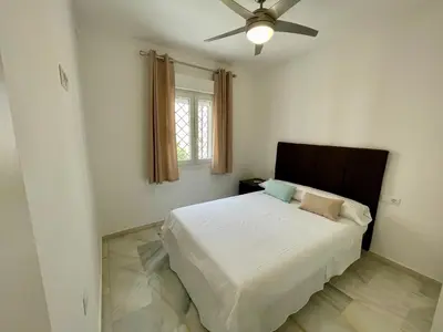 Cama o camas de una habitación en Apartamentos Valparaiso II