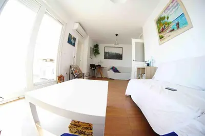 Cama o camas de una habitación en Ático con terraza en el Toyo